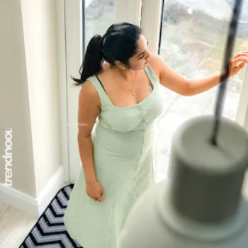 Divya Abraham mint green sleeveless button dress