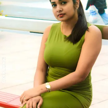 Divya Abraham green sleeveless bodycon dress