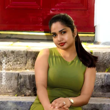 Divya Abraham green sleeveless bodycon dress