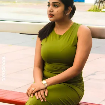 Divya Abraham green sleeveless bodycon dress