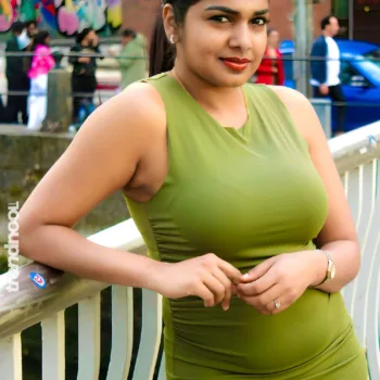 Divya Abraham green sleeveless bodycon dress