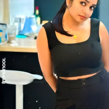 Divya Abraham green sleeveless bodycon dress