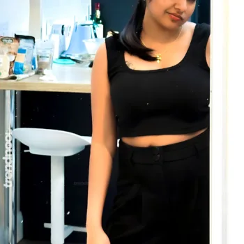 Divya Abraham green sleeveless bodycon dress