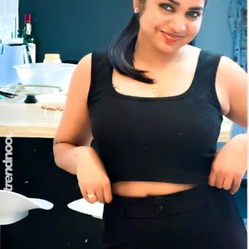 Divya Abraham green sleeveless bodycon dress
