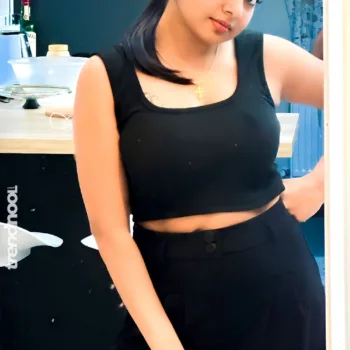 Divya Abraham green sleeveless bodycon dress