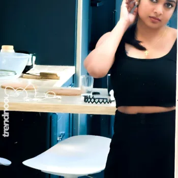 Divya Abraham green sleeveless bodycon dress
