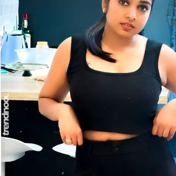 Divya Abraham green sleeveless bodycon dress