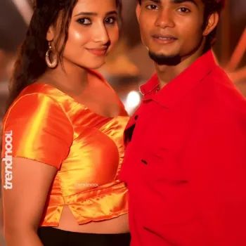 Krishna Shilpa orange satin crop top