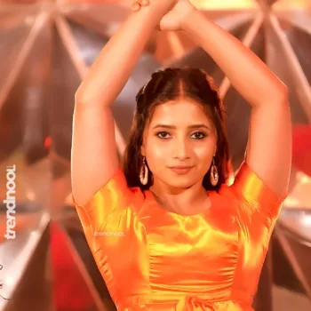 Krishna Shilpa orange satin crop top