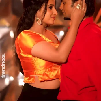 Krishna Shilpa orange satin crop top