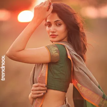 Losliya Mariyanesan green striped saree