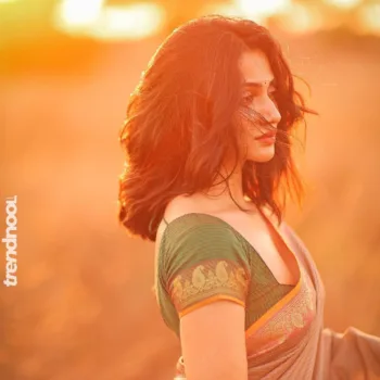 Losliya Mariyanesan green striped saree