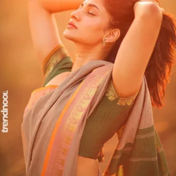 Losliya Mariyanesan green striped saree