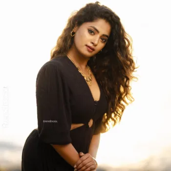 Sangeetha Kalyankumar black beach cutout dress