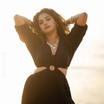 Sangeetha Kalyankumar black beach cutout dress