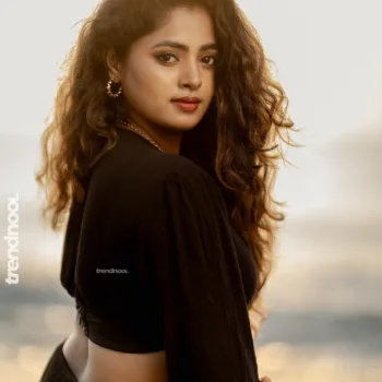 Sangeetha Kalyankumar black beach cutout dress