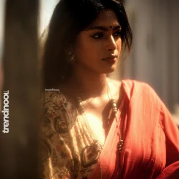 Vinusha Devi coral pink saree
