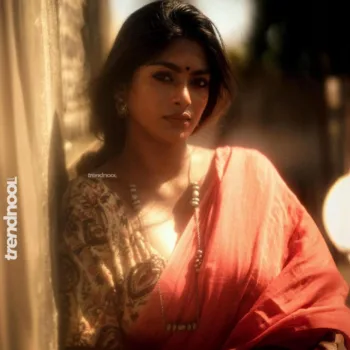 Vinusha Devi coral pink saree