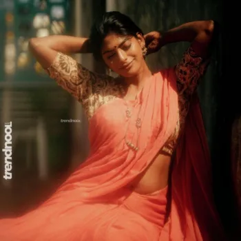 Vinusha Devi coral pink saree