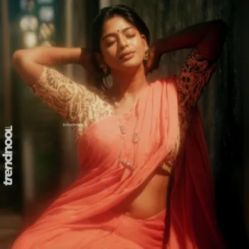 Vinusha Devi coral pink saree