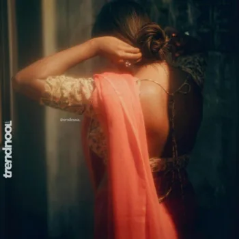 Vinusha Devi coral pink saree