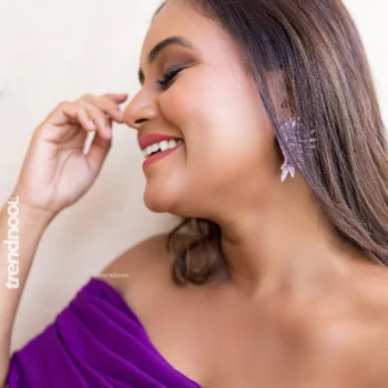 Dinakshie Priyasad purple off-shoulder gown