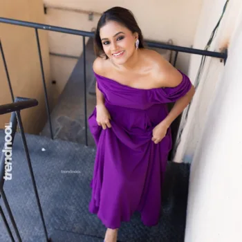 Dinakshie Priyasad purple off-shoulder gown
