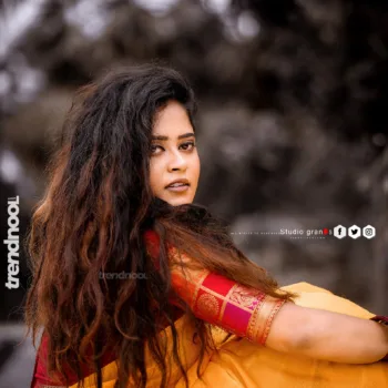 Remonisha Uthayakumar yellow saree maroon blouse