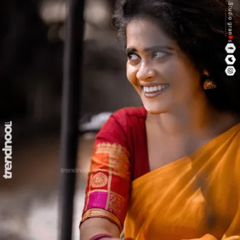 Remonisha Uthayakumar yellow saree maroon blouse