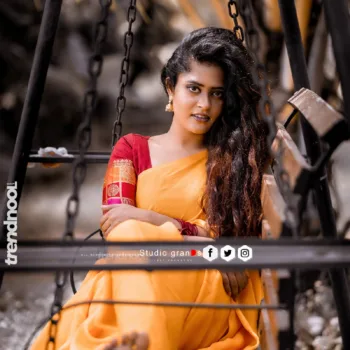 Remonisha Uthayakumar yellow saree maroon blouse