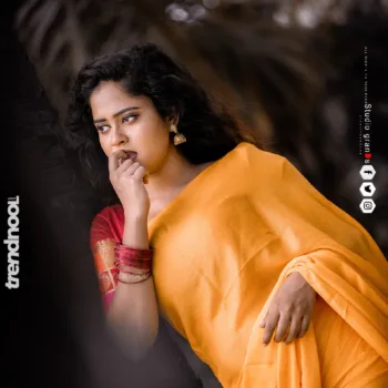 Remonisha Uthayakumar yellow saree maroon blouse
