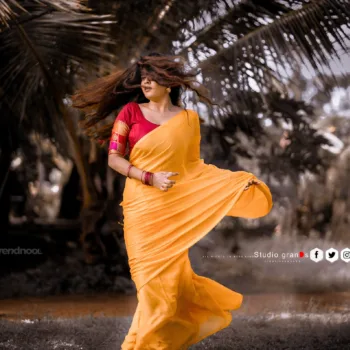 Remonisha Uthayakumar yellow saree maroon blouse