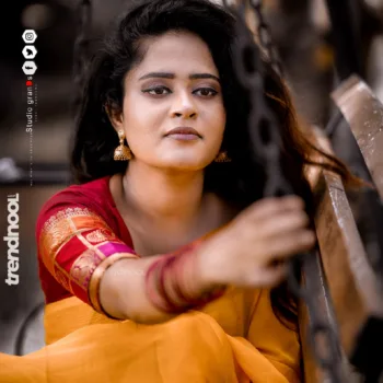 Remonisha Uthayakumar yellow saree maroon blouse