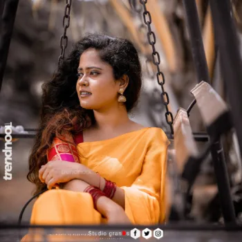 Remonisha Uthayakumar yellow saree maroon blouse