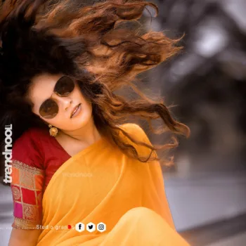 Remonisha Uthayakumar yellow saree maroon blouse