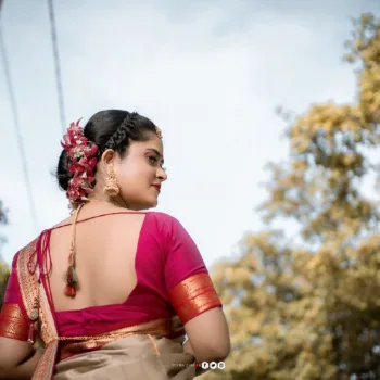 Remonisha Uthayakumar gold saree maroon blouse