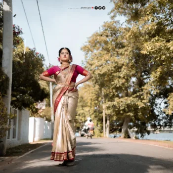 Remonisha Uthayakumar gold saree maroon blouse