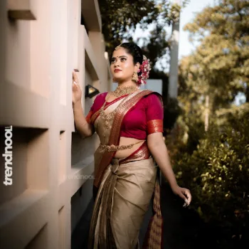 Remonisha Uthayakumar gold saree maroon blouse