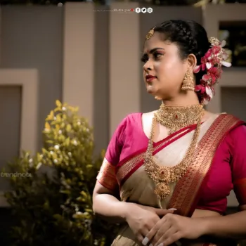 Remonisha Uthayakumar gold saree maroon blouse
