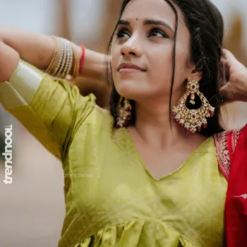 Ajitha Chandrasekaran green anarkali with red dupatta