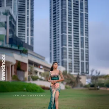 Jeramine Alexander green sequin slit evening gown