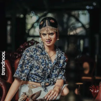 Poorvika Rasasingam floral shirt and white skirt