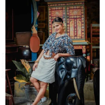 Poorvika Rasasingam floral shirt and white skirt