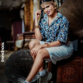 Poorvika Rasasingam floral shirt and white skirt