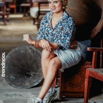 Poorvika Rasasingam floral shirt and white skirt
