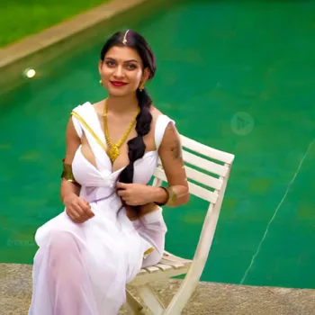 Resmi R Nair white saree