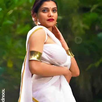 Resmi R Nair white saree
