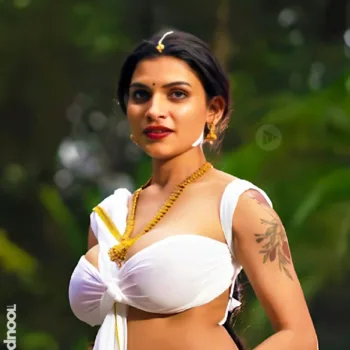 Resmi R Nair white saree