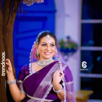 Shyamala Amar purple satin saree