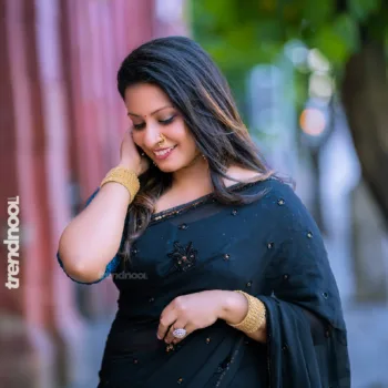 Shyamala Amar black georgette saree